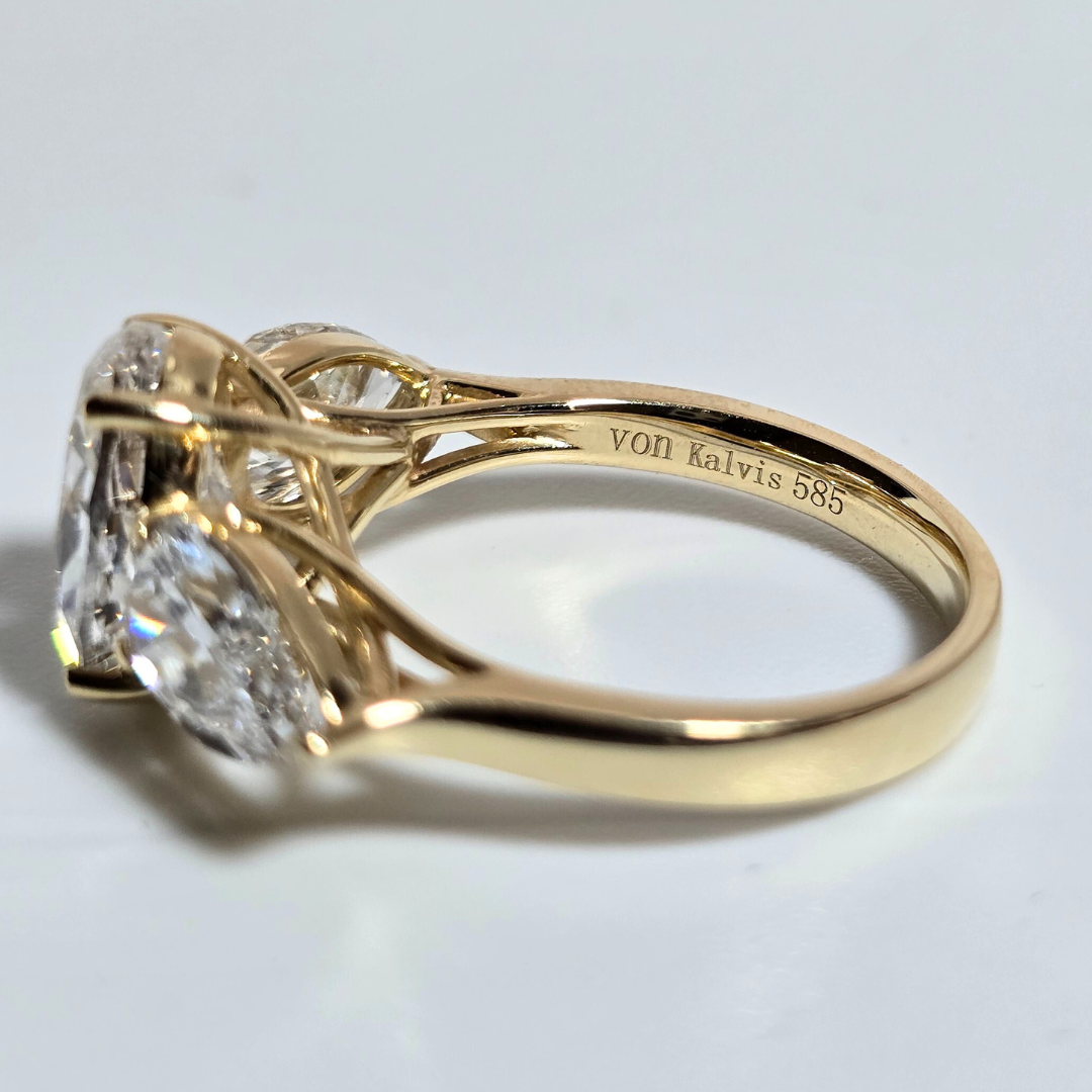 5.00ct Oval Cut Lab Grown Diamond Trilogy Ring with Pear Side Stones in 14ct Yellow Gold