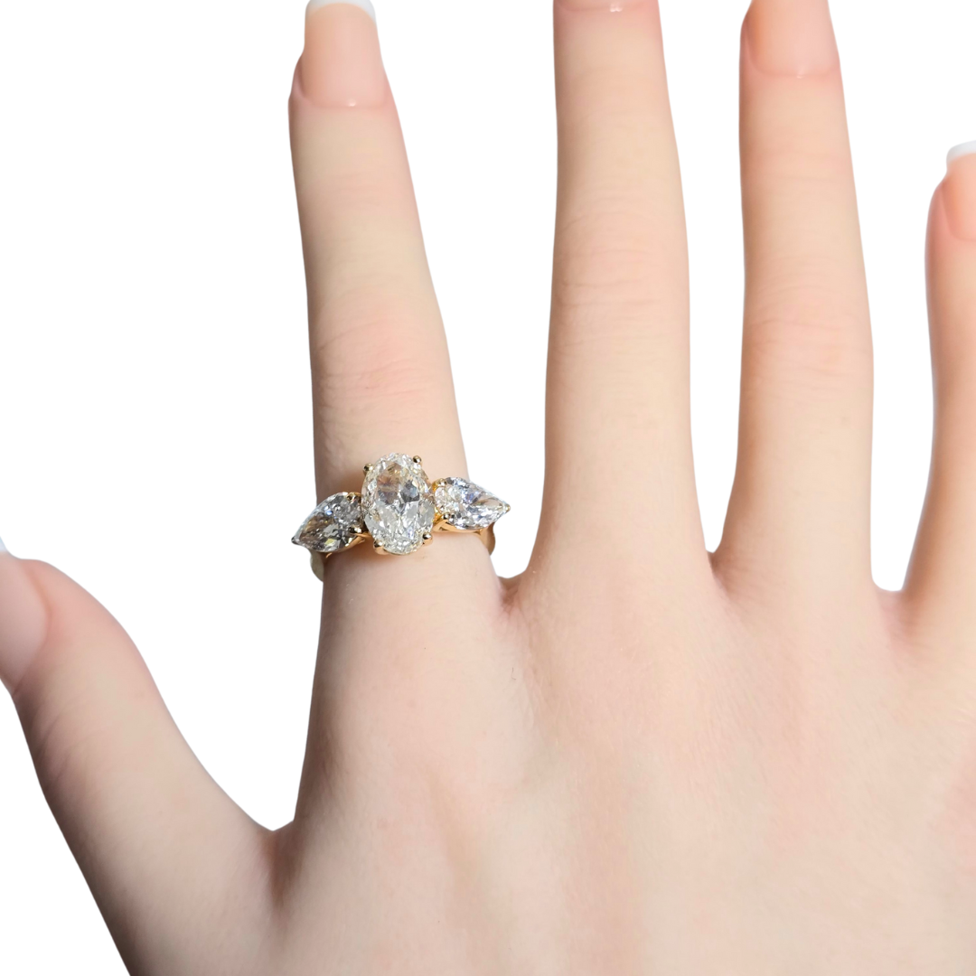 5.00ct Oval Cut Lab Grown Diamond Trilogy Ring with Pear Side Stones in 14ct Yellow Gold