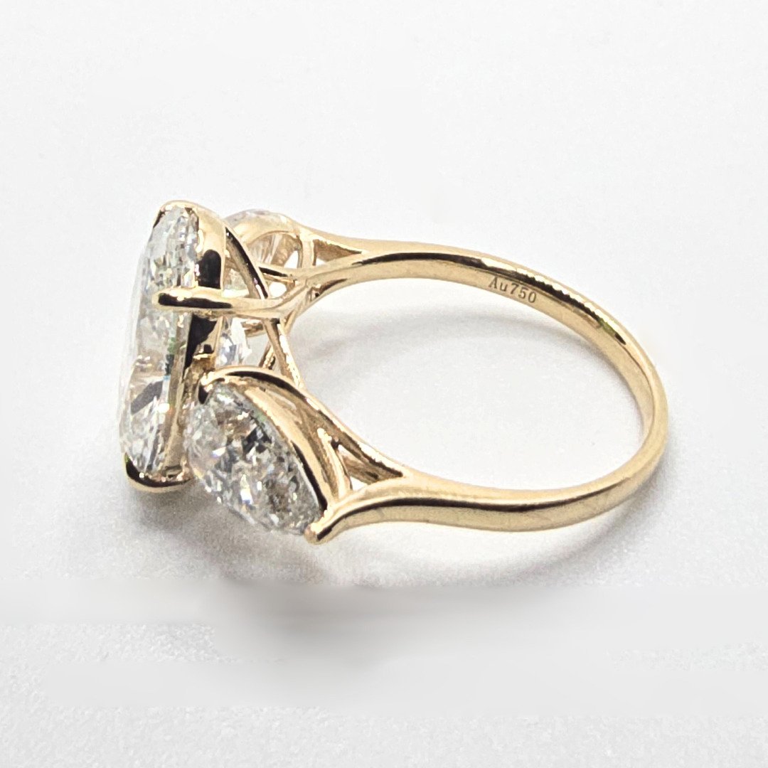 6.41cts Oval Cut Lab-Grown Diamond Trilogy Ring – 18ct Yellow Gold | 3 IGI Certificates