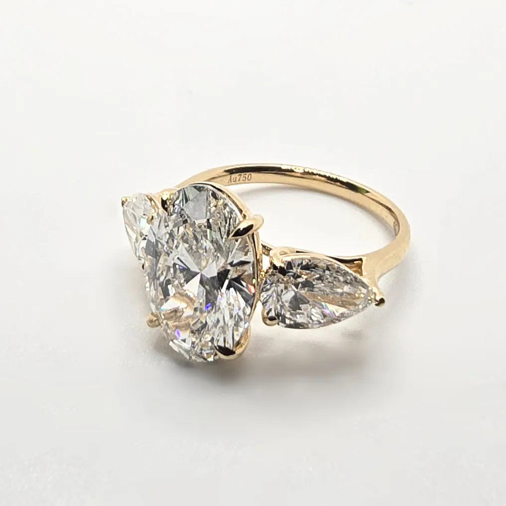 6.41cts Oval Cut Lab-Grown Diamond Trilogy Ring – 18ct Yellow Gold | 3 IGI Certificates