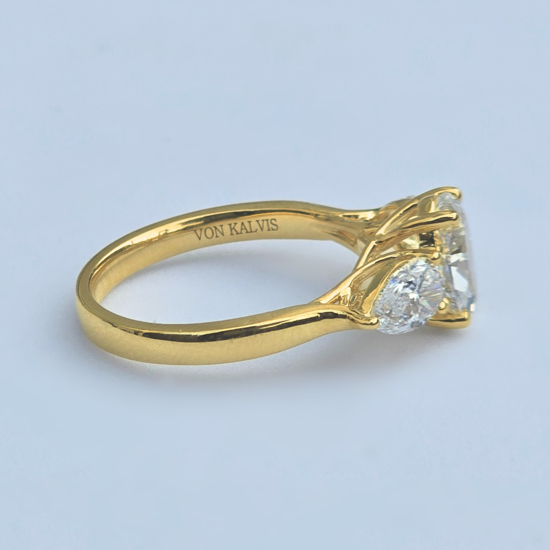 Side view of IGI certified round brilliant diamond ring in yellow gold