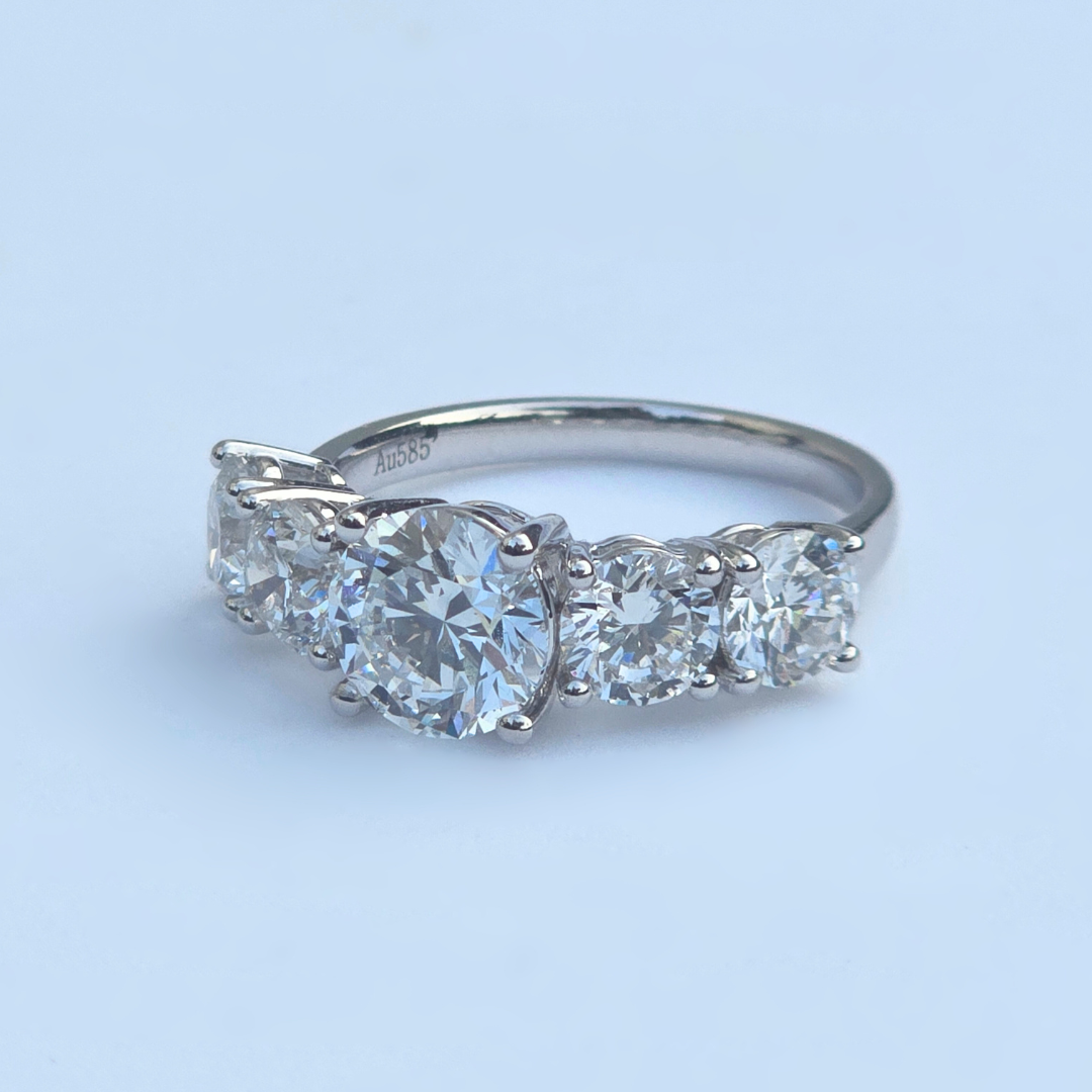 3.55ct round lab diamond five stone ring left side view, 14ct white gold band