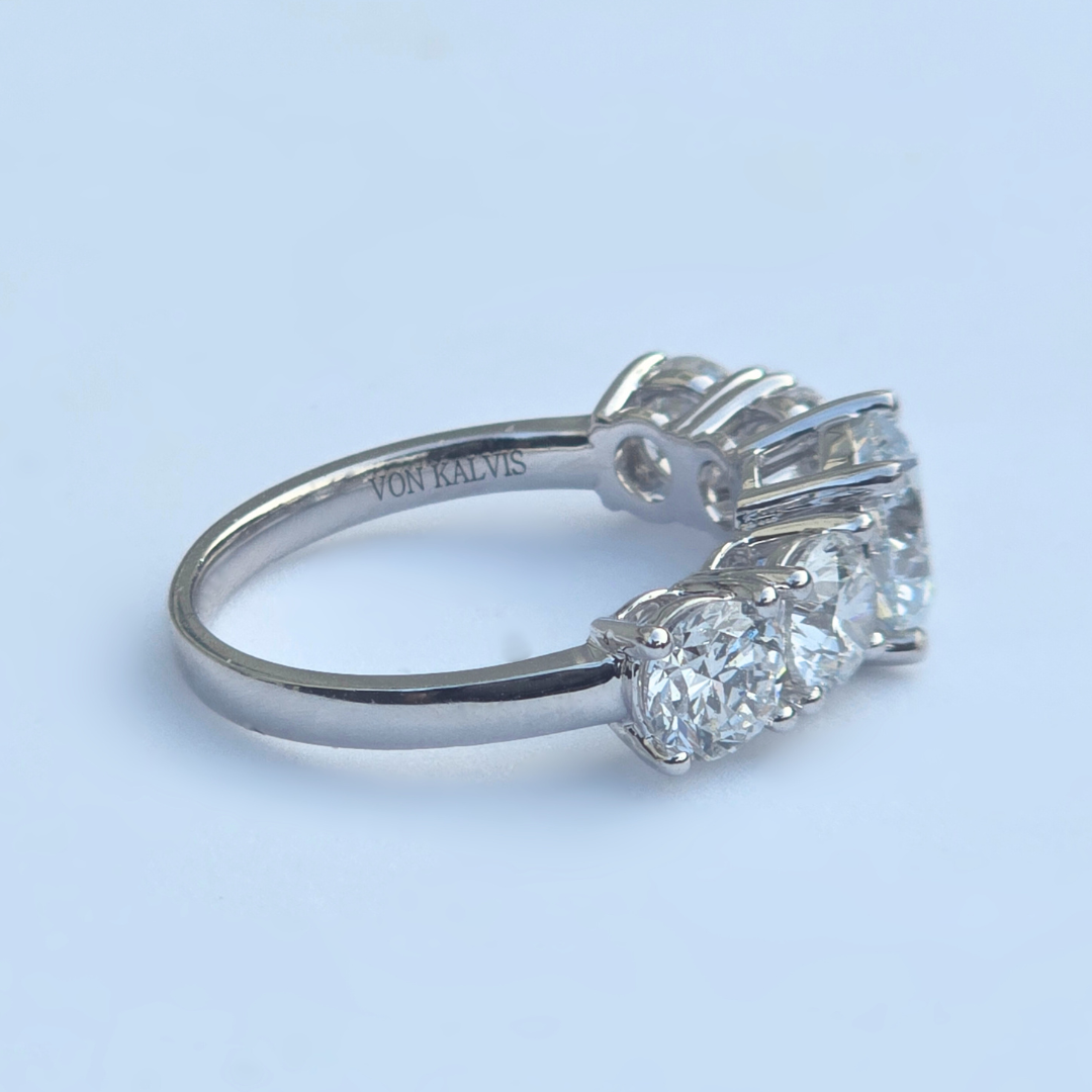 Inside inscription detail on 3.55ct lab diamond five stone ring, 14ct white gold hallmark