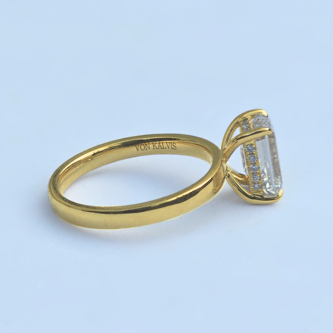 Inside inscription on emerald cut lab diamond ring, 14ct yellow gold hallmark detail