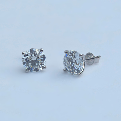 Inside inscription detail on 4.41ct lab diamond stud earring, 18ct white gold hallmark