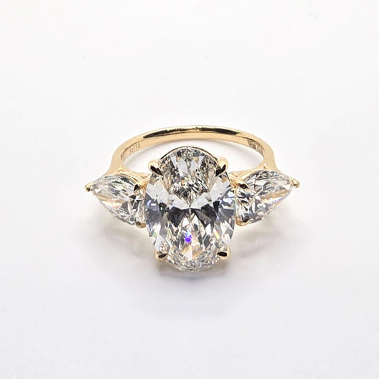 6.41cts Oval Cut Lab-Grown Diamond Trilogy Ring – 18ct Yellow Gold | 3 IGI Certificates
